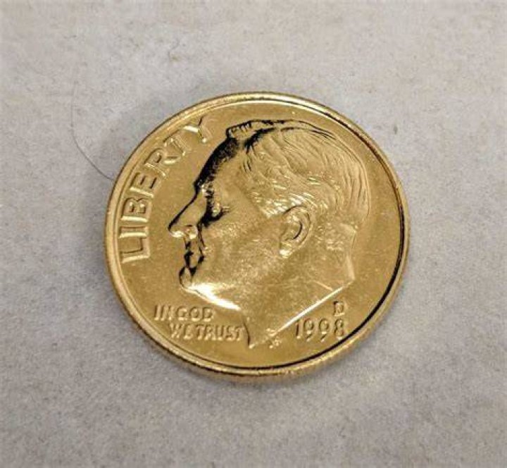 A gold plated dime coins