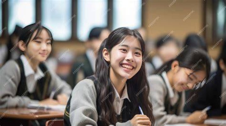 Asian high school students are competing in a Crossword or Scrabble