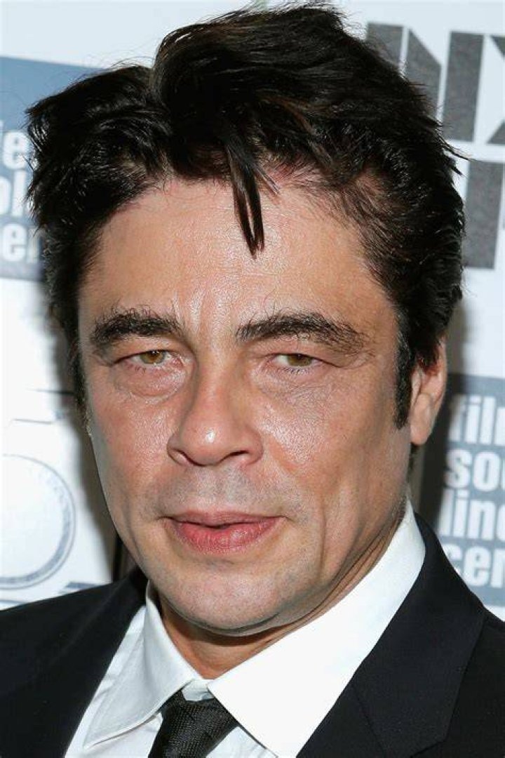 Benicio Del Toro gives his growing daughter Delilah a lift as they go