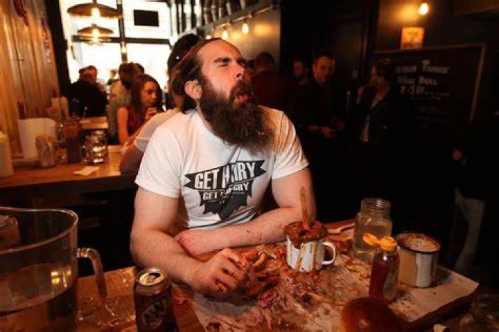 Extreme eater Adam Moran spends two hours a day in the gym to keep slim