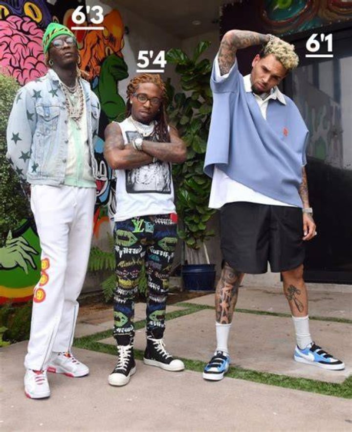 How Tall Is Chris Brown In Feet He's the size of a large. Download
