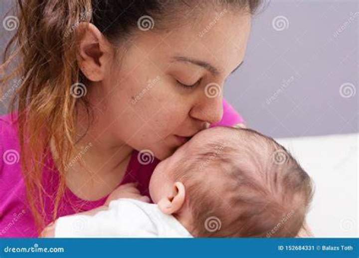 Mother Lovingly Kissing Her Newborn Baby Stock Image Image of life
